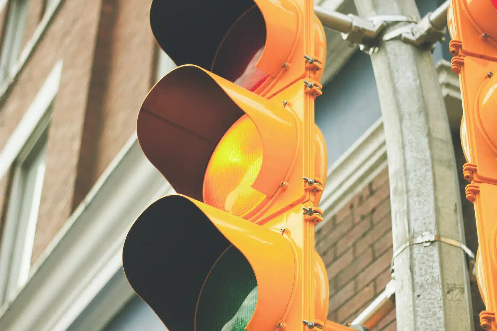 yellow painted traffic light