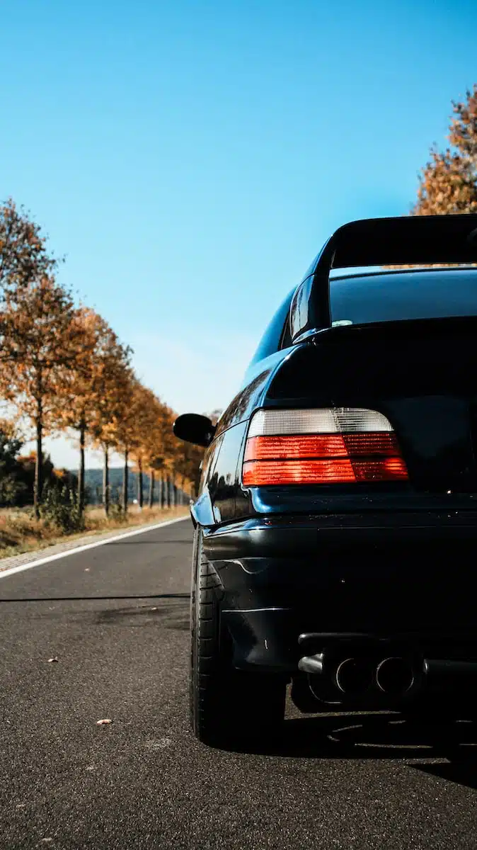 black car on road during daytime