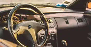 shallow focus photography of car steering wheel