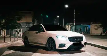 white mercedes benz coupe on road during night time